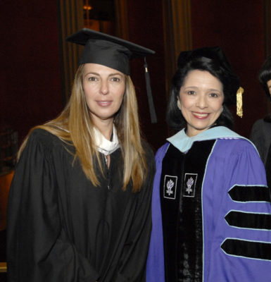 Joyce Brown and Nina Garcia in commencement regalia