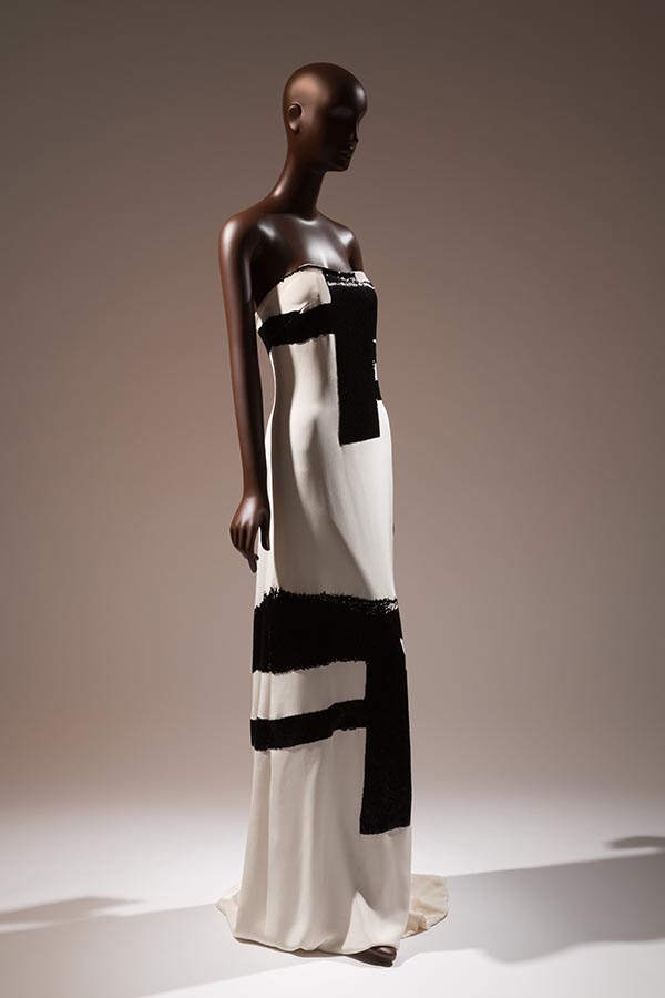 white strapless floor length dress with black micro bugle beads in a design inspired by Franze Kline
